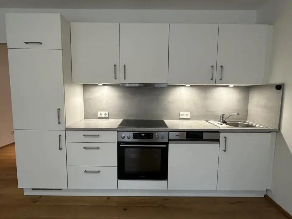Neuwertige Erdgeschoßwohnung 23. Bezirk: Stilvoll, modern und komfortabel - mit Gemeinschaftsgarten und Tiefgarage