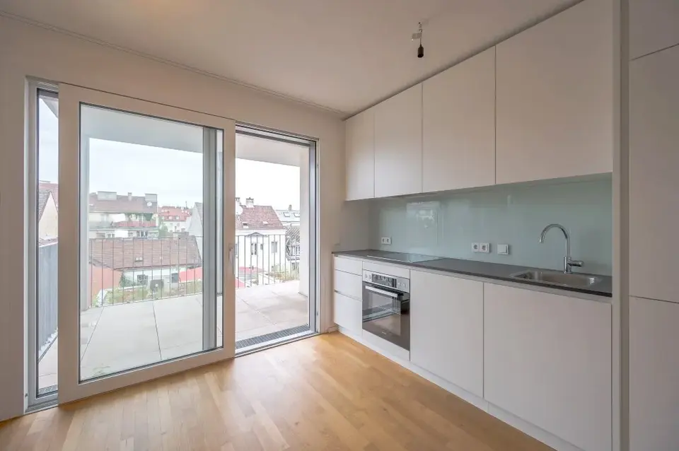 ***NEU*** Energie-effizienter Neubau mit Südost - Balkon & top Infrastruktur