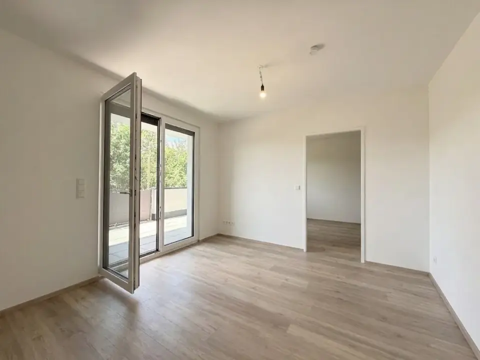 Sonnige 2-Zimmer-Wohnung mit großem Balkon und Kühlung!